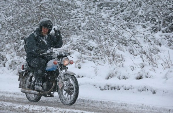 159660131 Riding Motorcycle in Snow Matt Cady Getty e1392827206860